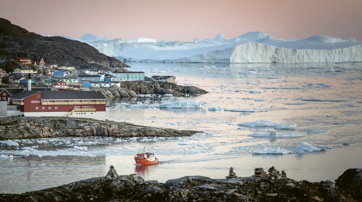 A-passenger-boat-near-Ilulissat-and-the-ice-fjord-in-Greenland