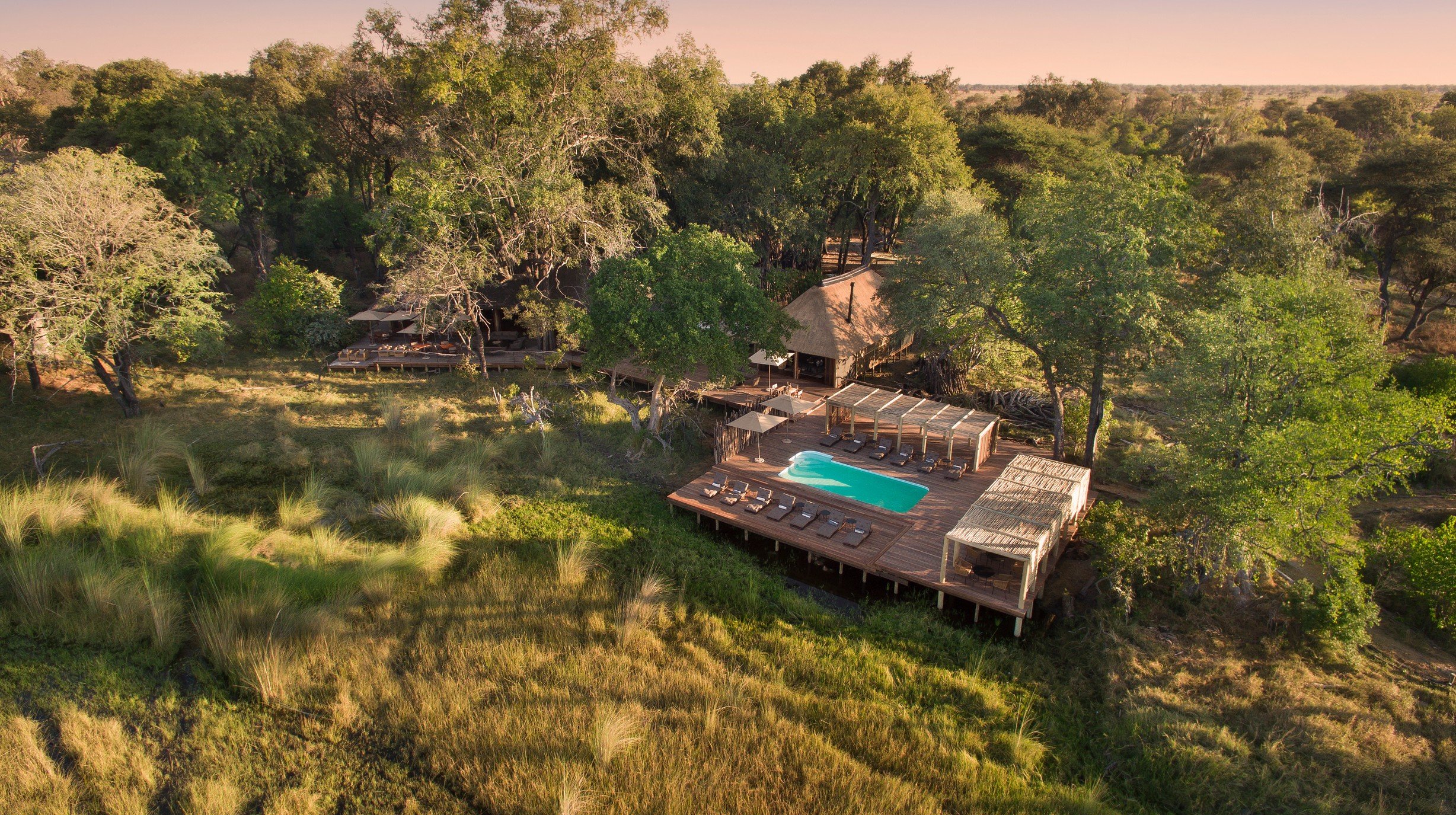 Botswana-andBeyondNxabega-Okavango-Tented-Camp-Aerial-view-of-swimming-pool