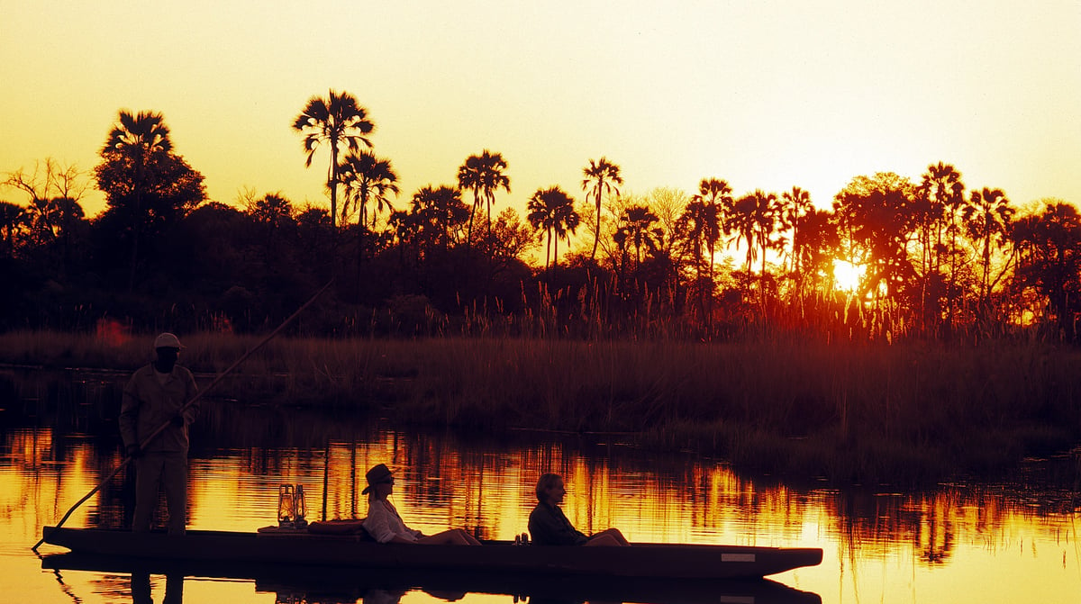 Botswana-andBeyondNxabega-Okavango-Tented-Camp-Experience-Mokoro-ride-at-sunset