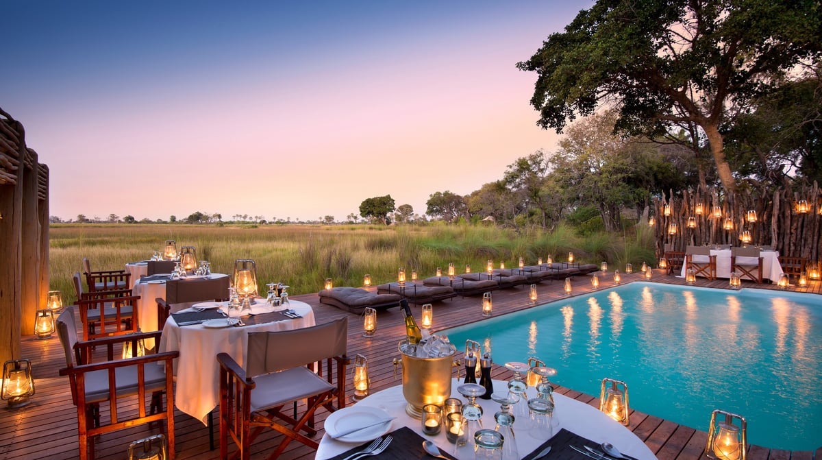 Botswana-andBeyondNxabega-Okavango-Tented-Camp-Guest-Area-Romantic-dinner-at-the-pool