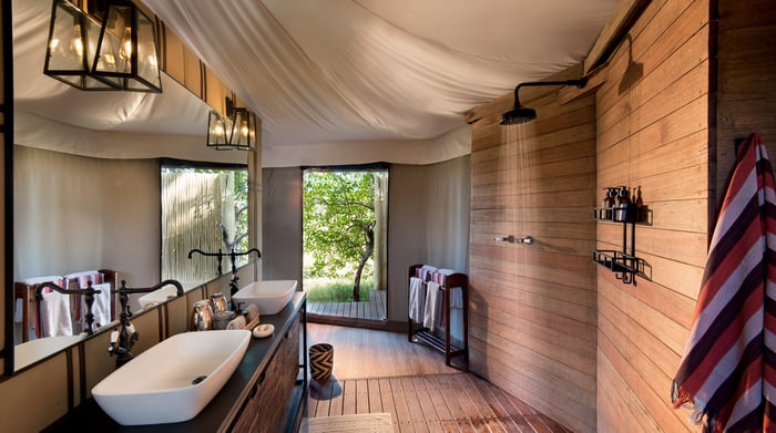 Botswana-andBeyondNxabega-Okavango-Tented-Camp-Tent-bathroom