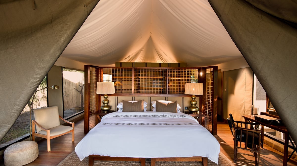 Botswana-andBeyondNxabega-Okavango-Tented-Camp-Tent-bedroom-bed
