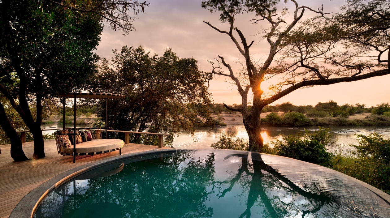 Tanzania-andbeyond-Grumeti-Serengeti-River-Lodge-Guest-Areas-pool-and-loungers _2_