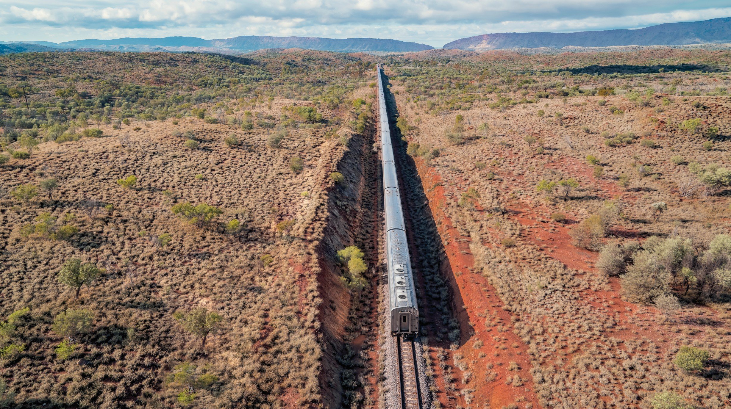 The Ghan Heading south to Alice Springs. The Gap and the MacDonnell Ranges in the background