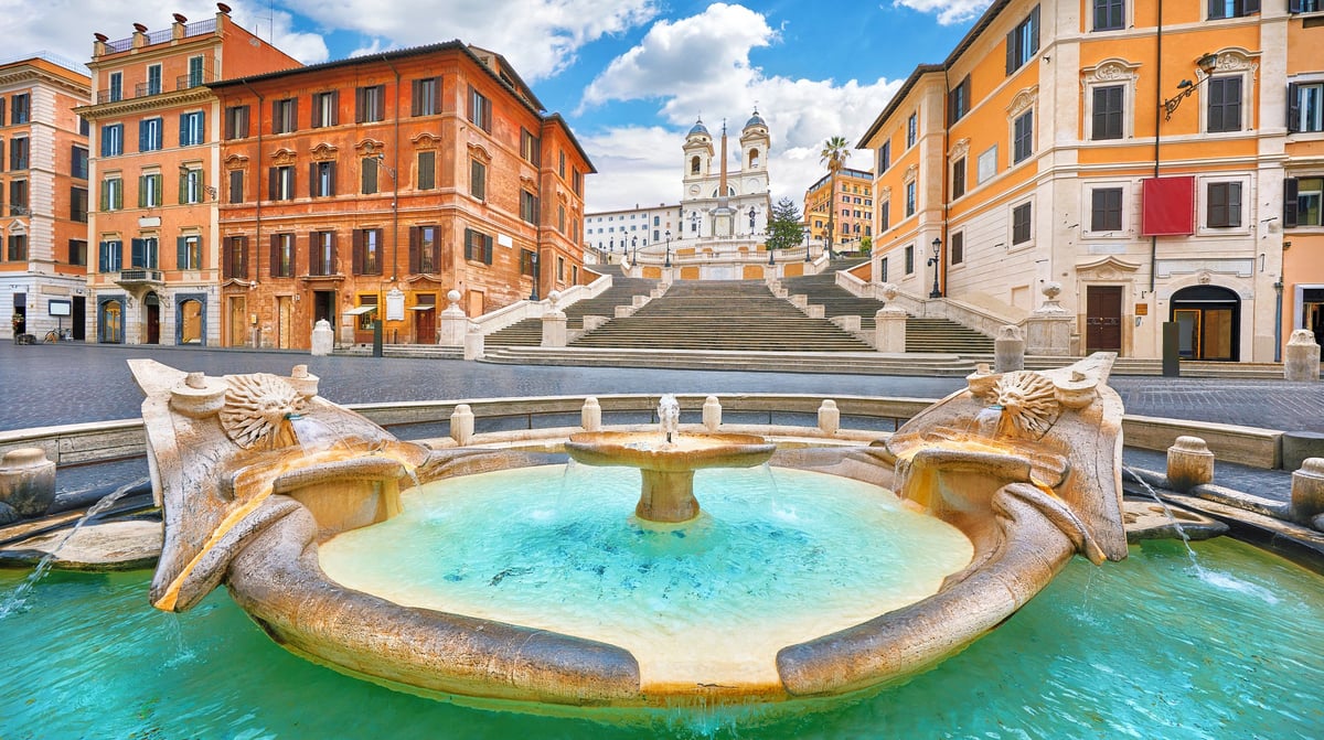 Fontana della Barcaccia) on Spanish square (Piazza di Spagna, Rome shutterstock_1391910035